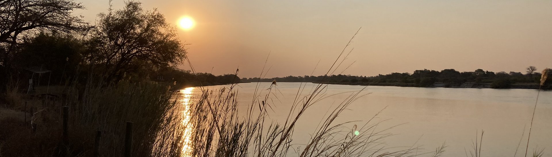 bushbundu-car-rental-windhoek-namibia-image-of-sunset-near-a-lake-insurance-page-cover-image