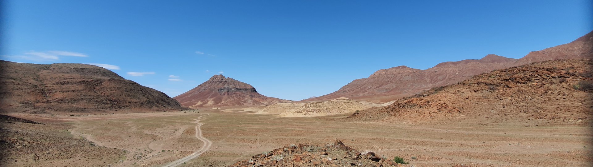 bushbundu-car-rental-windhoek-namibia-vehicle-rates-cover-image-namibia-desert-with-rock-formations