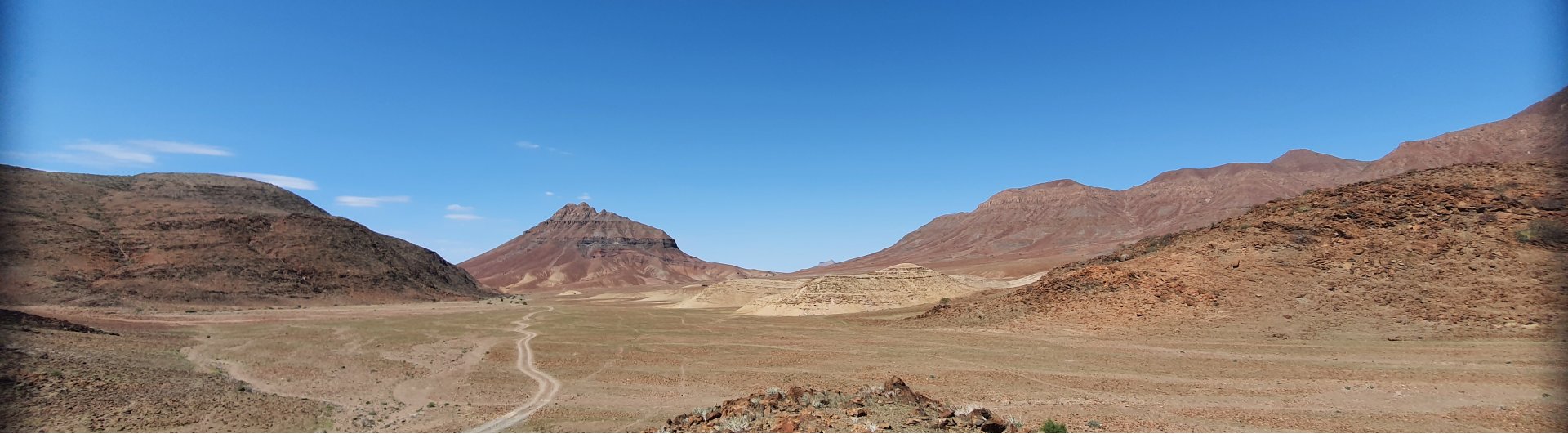 bushbundu-car-rental-windhoek-namibia-vehicle-rates-cover-image-namibia-desert-with-rock-formations